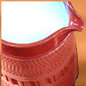 

   Glazed terracotta jugs   
   from Onevillage.com

   Oko milk jug
   One Oko India


