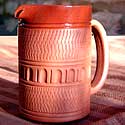 

   Glazed terracotta jugs   
   from Onevillage.com

   Oko milk jug
   One Oko India


