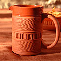 

   Glazed terracotta jugs   
   from Onevillage.com

   Oko milk jug
   One Oko India

