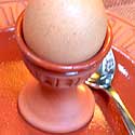 

   Glazed terracotta egg cups   
   from Onevillage.com

   Oko egg cup
   One Oko India

