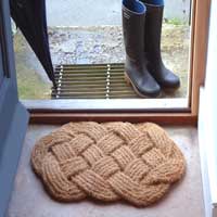 

   11899 Knot doormat

   100% coir door mat
   With «boot-scraper» effect!   

