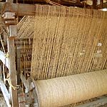 

   Coir warp on the loom   

