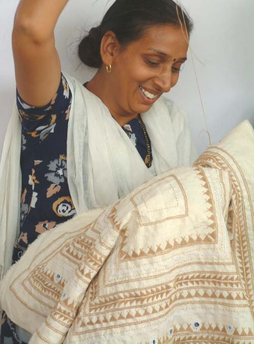 

   Kathiawadi embroiderer of
   Onevillage.com Ahmedabad cushion cover   

   Please click to next picture
 
