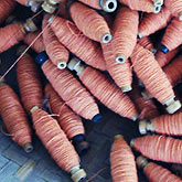 

   Bobbins of yarn prior to weaving  
.
