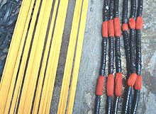 

   Yarn undyed and dyed (with binding tied on)   
.

