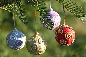 

   Four festive ball decorations   
.
