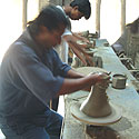 

   Oko potters
   at the wheels      

