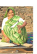 

   Weaver of the
   Punja durry
   available from Onevillage.org   

